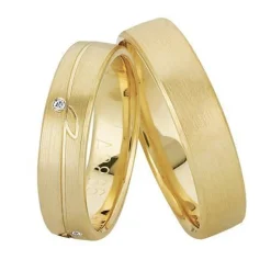 Nuran - Trauringe aus 8-14kt. Rotgold mit 1 Brillant im Damenring