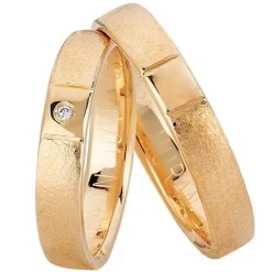 Nuran - Trauringe aus 14kt. Roségold mit 1 Brillant im Damenring