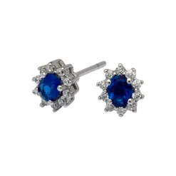 Silberne Nieten mit Zirkonia und Kunststoff. blauer Saphir